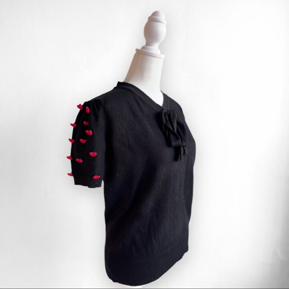 Heart sleeved sweater